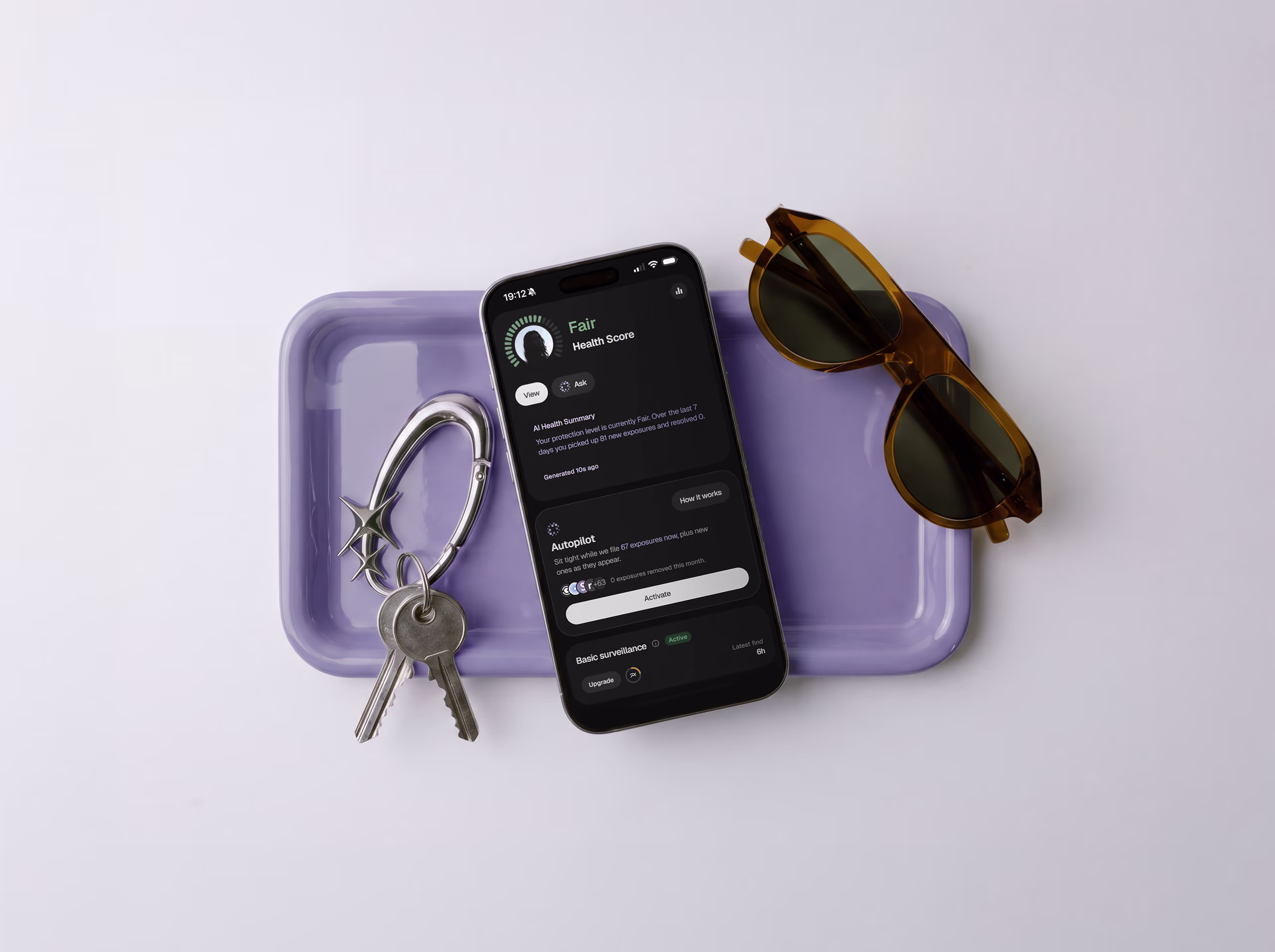 A phone running the Serus app resting on a sculpted white surface